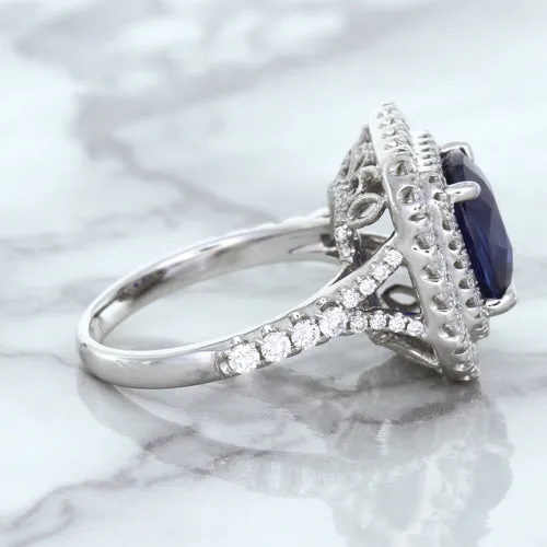 4.35ct Cushion Blue Sapphire Ring with Double Diamond Halo in 18K White Gold