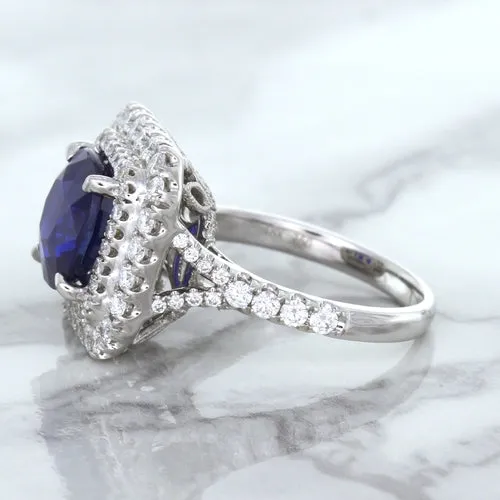 4.35ct Cushion Blue Sapphire Ring with Double Diamond Halo in 18K White Gold