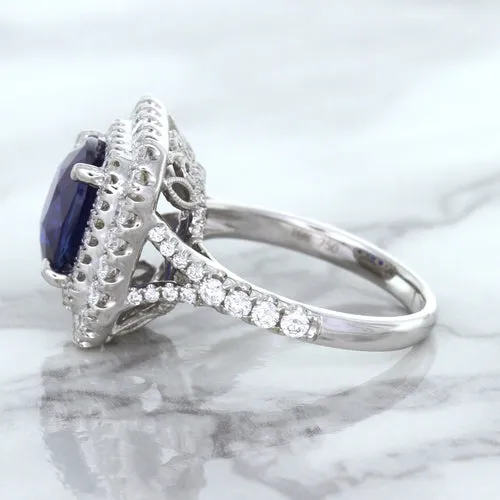 4.35ct Cushion Blue Sapphire Ring with Double Diamond Halo in 18K White Gold