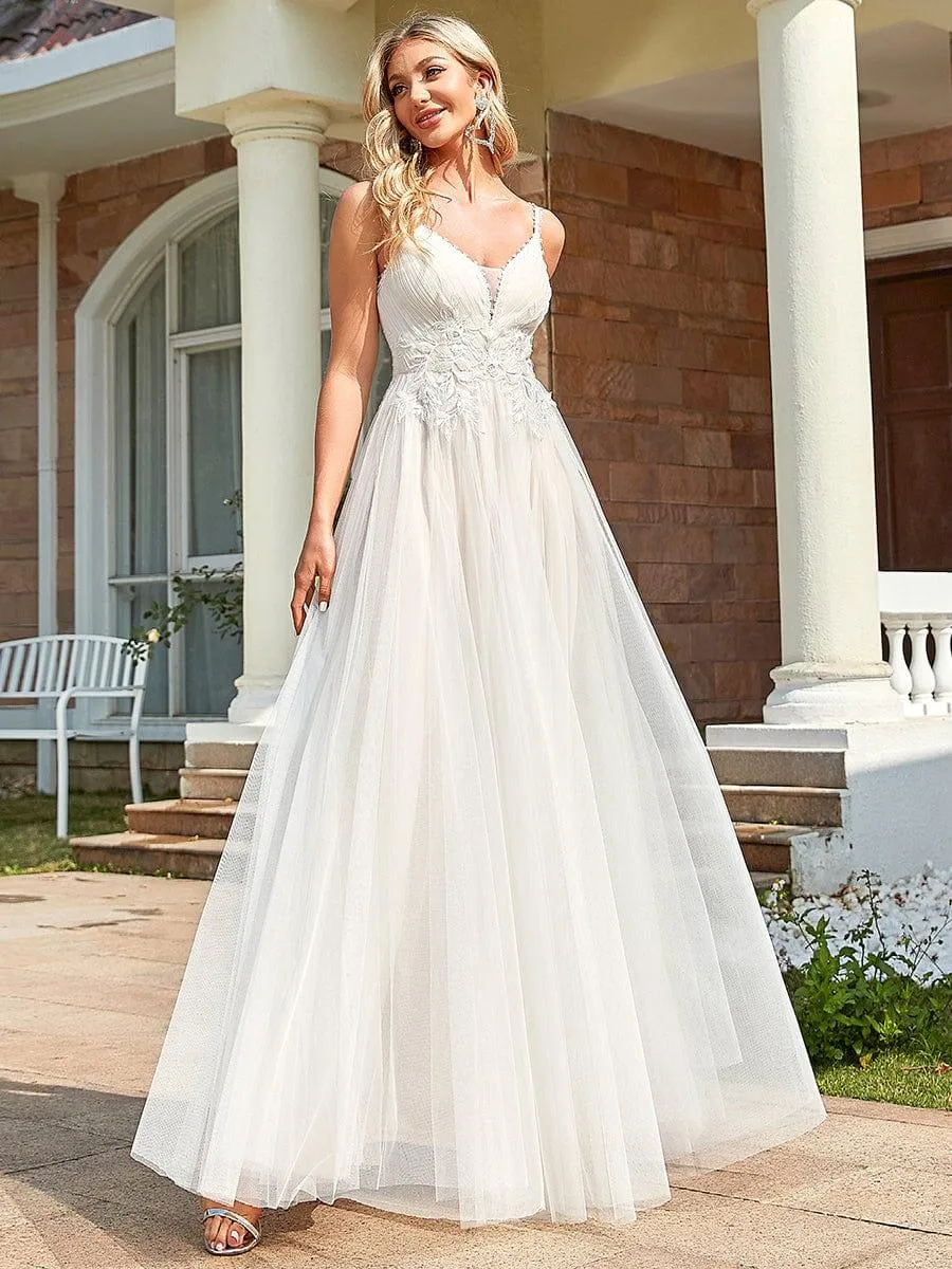 Robe de mariée A-ligne à encolure en V brodée à bretelles spaghetti